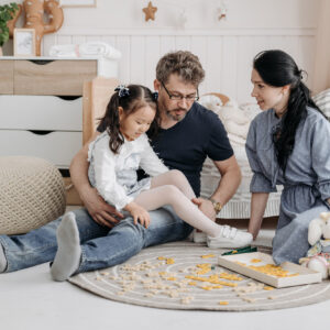 Parents and child playing